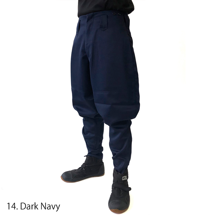 Full body view of Toraichi navy horse riding pants styled with boots