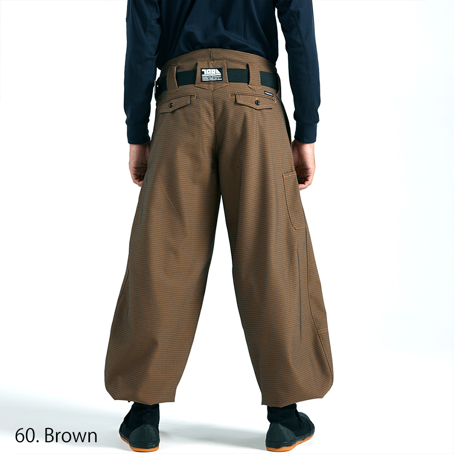 Traditional tobi pants in brown shown from the side view