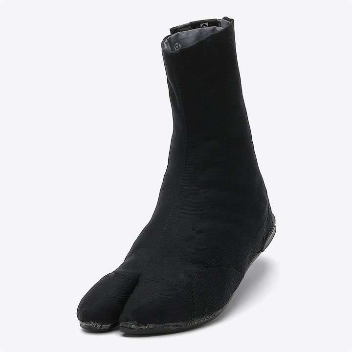 Front view of black Japanese Tabi shoes with traditional split-toe design