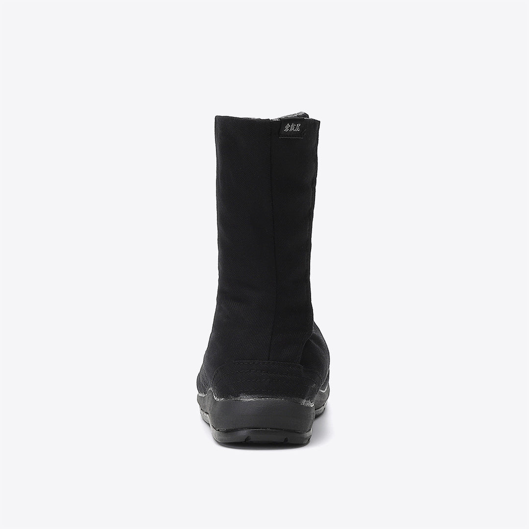 Side profile of traditional Japanese Tabi work boots in black