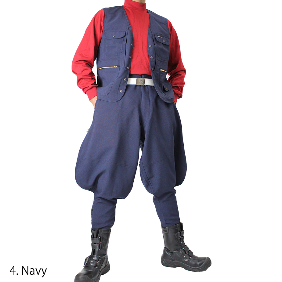 Side angle of navy Toraichi seven-quarter pants highlighting wide thigh cut and slim ankle taper
