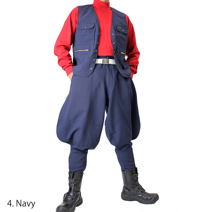 Side angle of navy Toraichi seven-quarter pants highlighting wide thigh cut and slim ankle taper