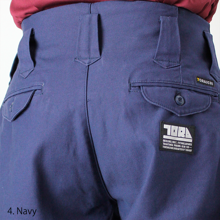 Toraichi tobi pants navy blue pocket with Toraichi logo patch detail