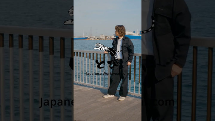 Outdoor city scene with Toraichi 2530-414 Long Nikka Pants red