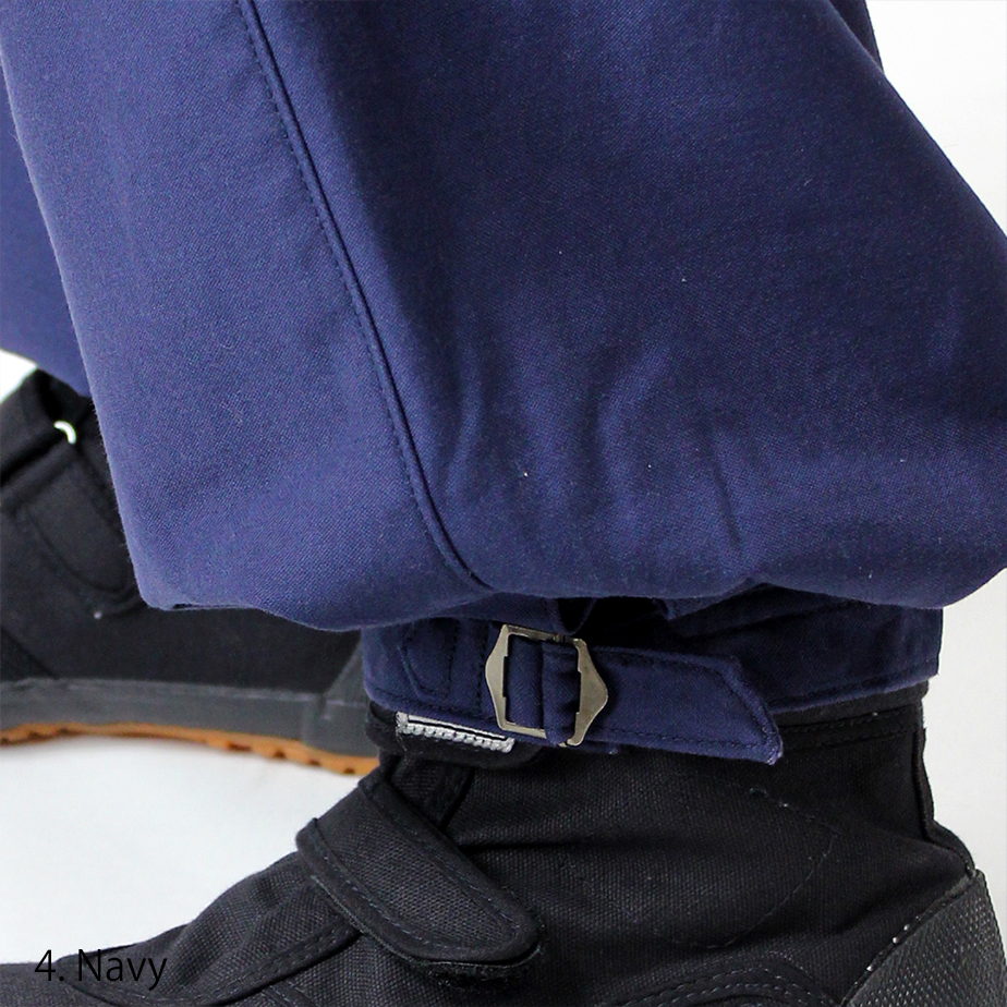 Worker wearing navy Japanese nikka pants with traditional tuck shape