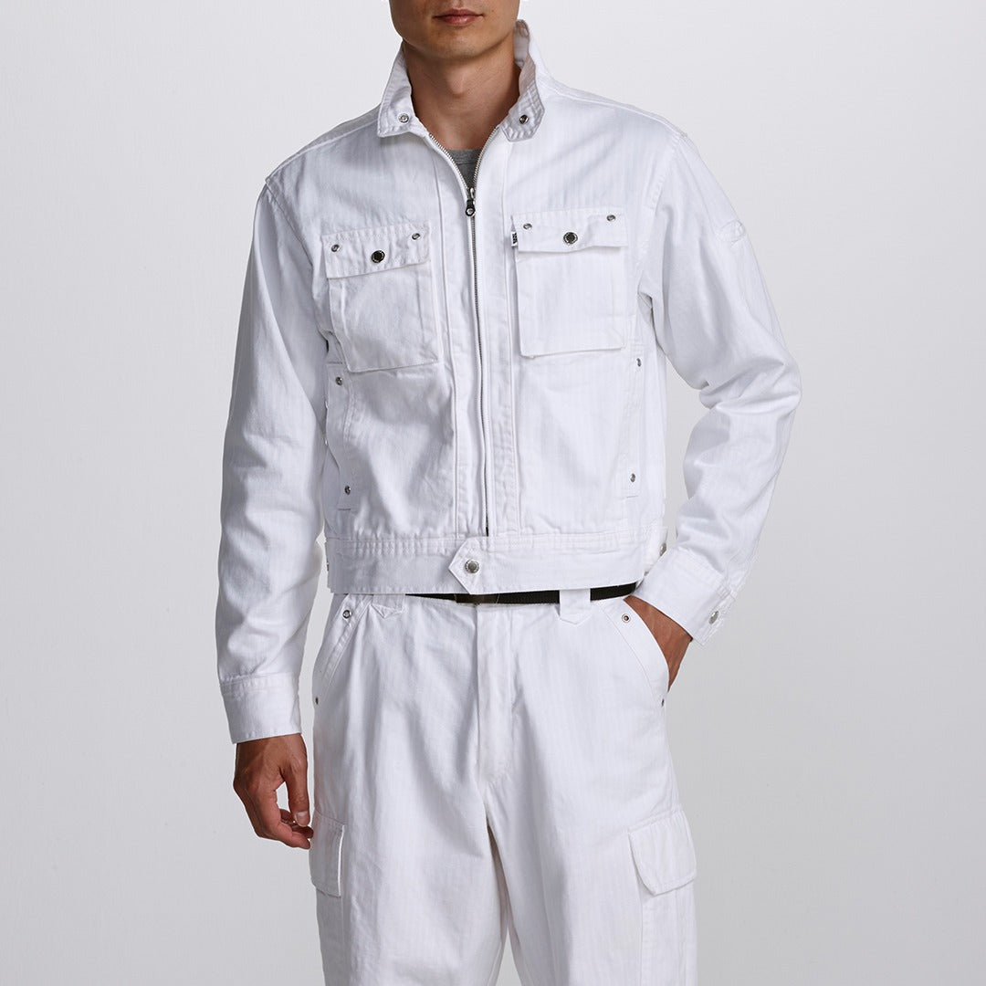 Front view of model wearing the white Toraichi 3942-554 TOBI jacket, representing the essence of Japanese workwear design