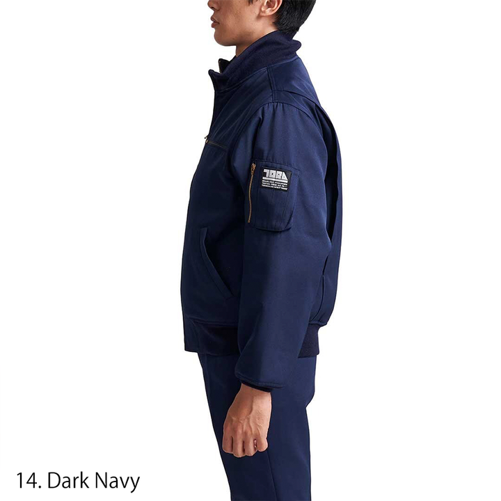 Side profile highlighting utility sleeve pocket and embroidered Toraichi logo patch