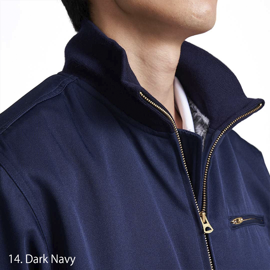Model adjusting collar of Toraichi Tankers Jacket showing soft inner lining