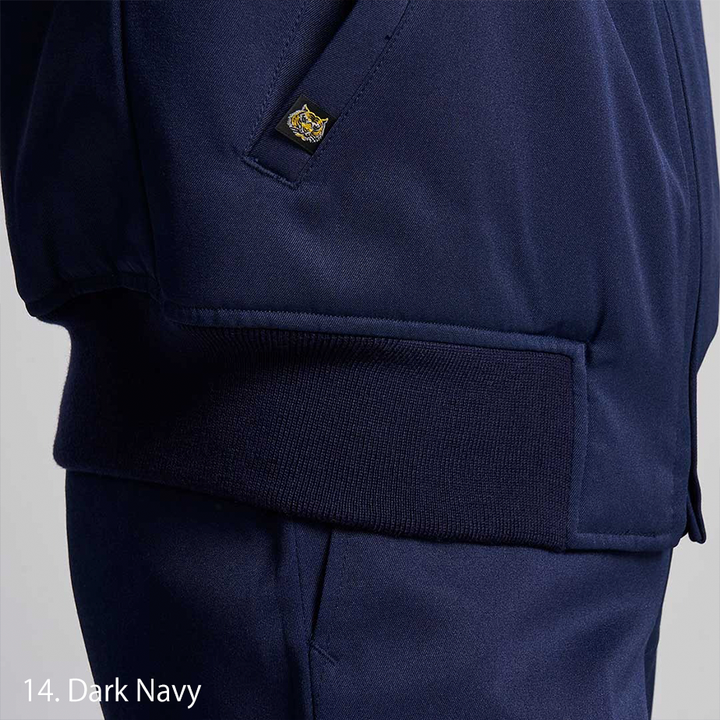 Detail of Toraichi logo patch stitched onto sleeve pocket