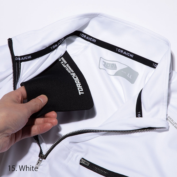 Close-up of the chest zipper pocket demonstrating secure storage and refined metal hardware.