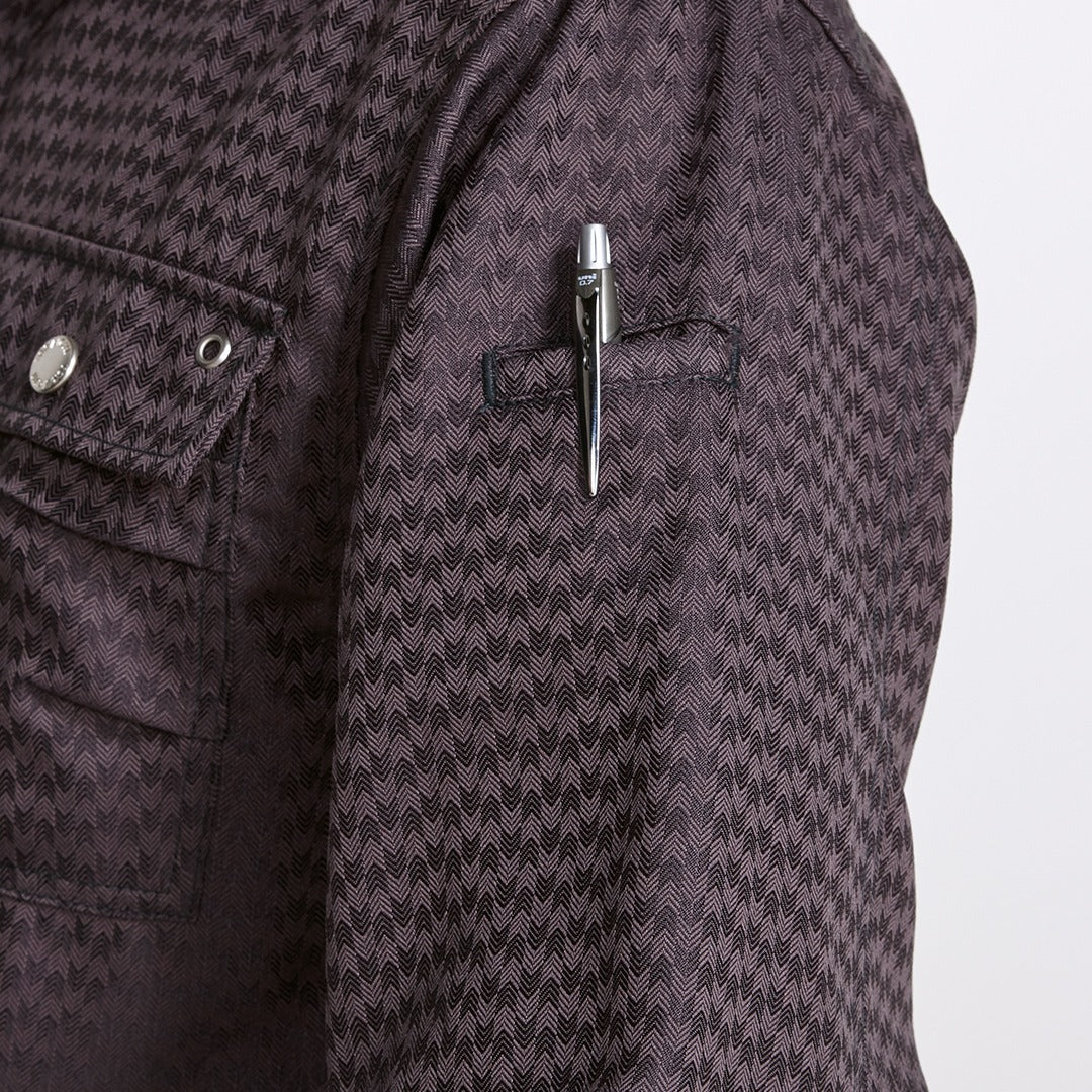 Close-up of collar showcasing neat structure and reinforced neckline stitching