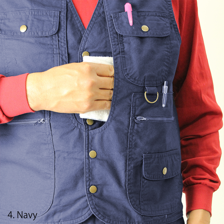 Model wearing Toraichi 1016-611 beige vest over red shirt and navy pants