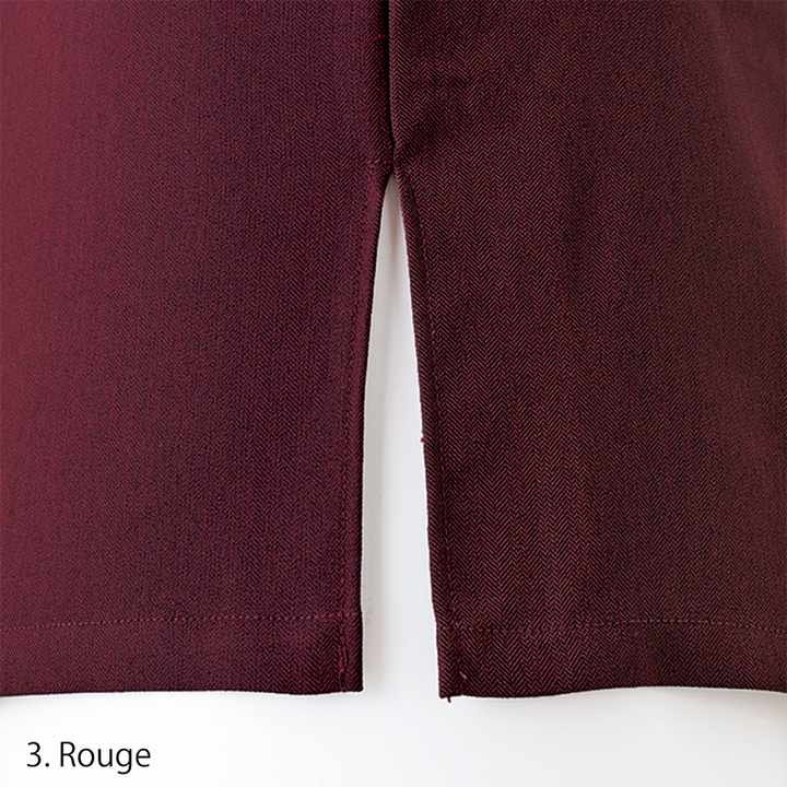 Three-quarter front view displaying flap chest pockets and hidden button placket