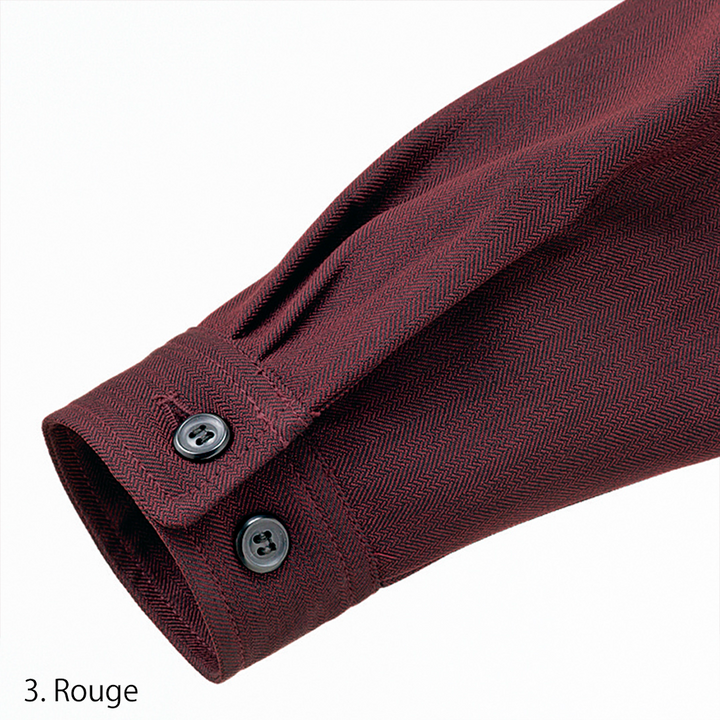 Close-up of pocket flap and Toraichi logo tag stitched on red pinstripe polyester fabric