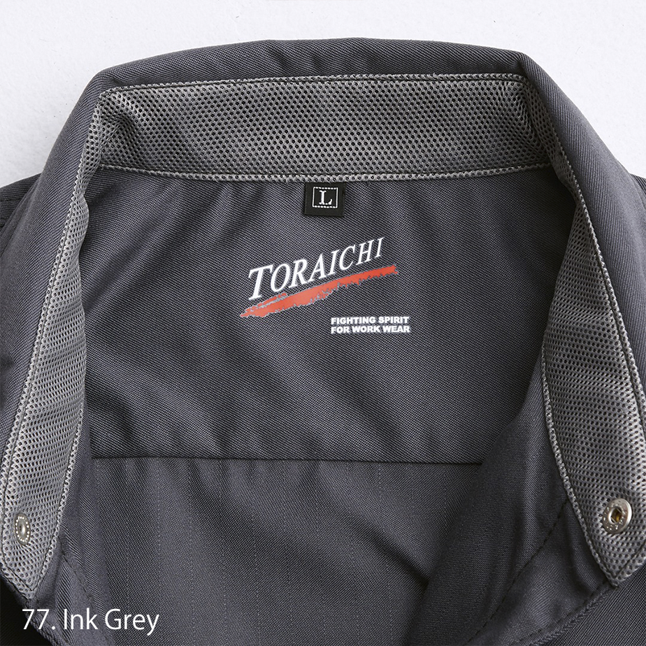 Fabric close-up showing polyester-cotton twill texture of Japanese workwear shirt