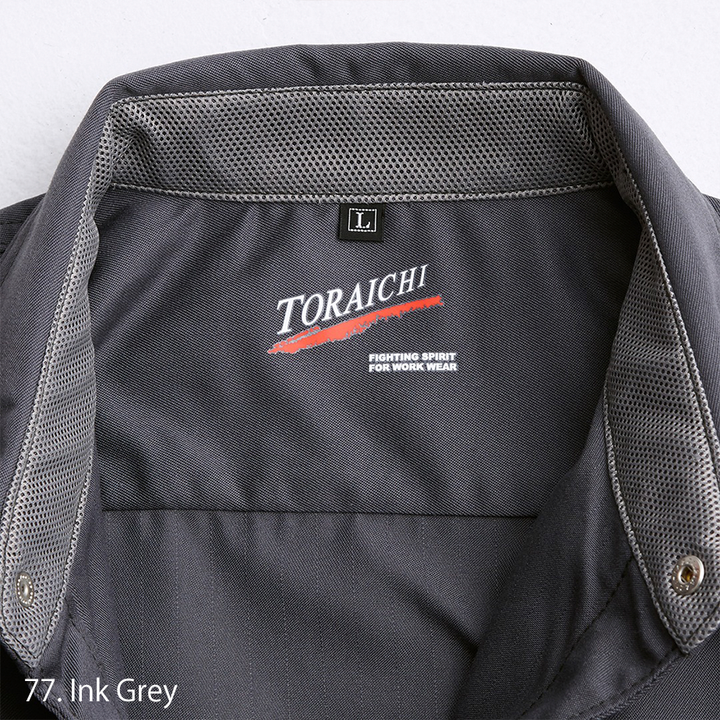 Fabric close-up showing polyester-cotton twill texture of Japanese workwear shirt