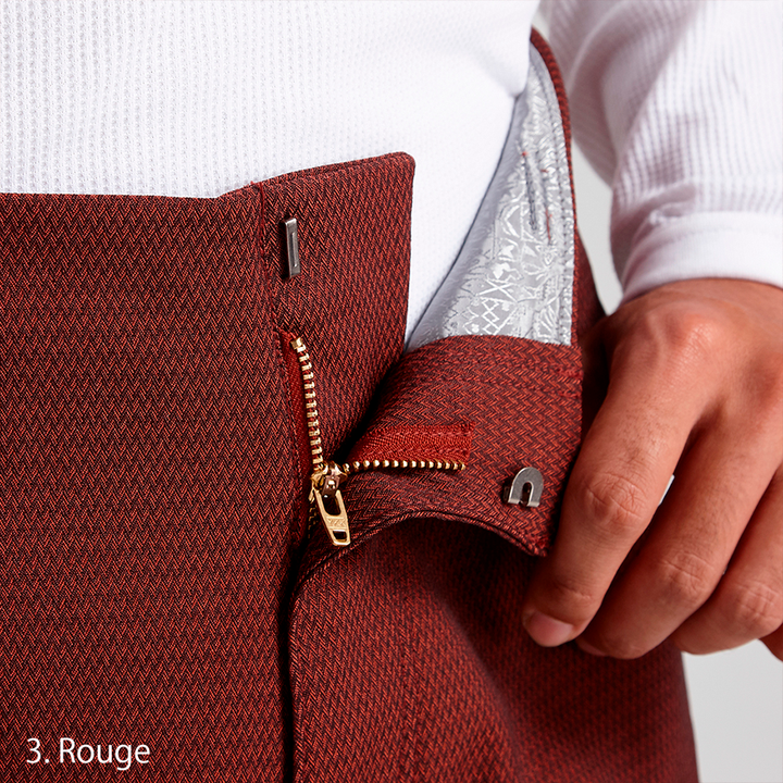 Back pocket detail of the Toraichi Japanese workwear trousers showing symmetrical placement and secure closure.