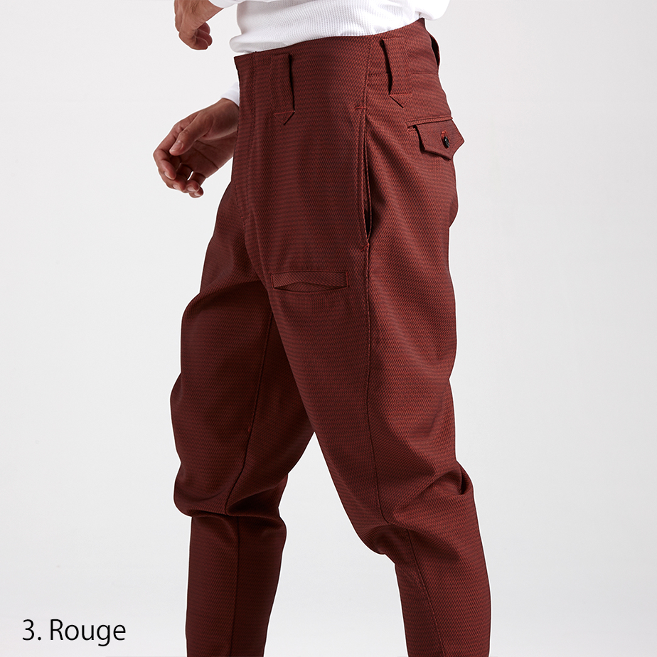 Side profile of the Toraichi Japanese workwear pants in rouge emphasizing the ergonomic shape and clean taper for mobility.