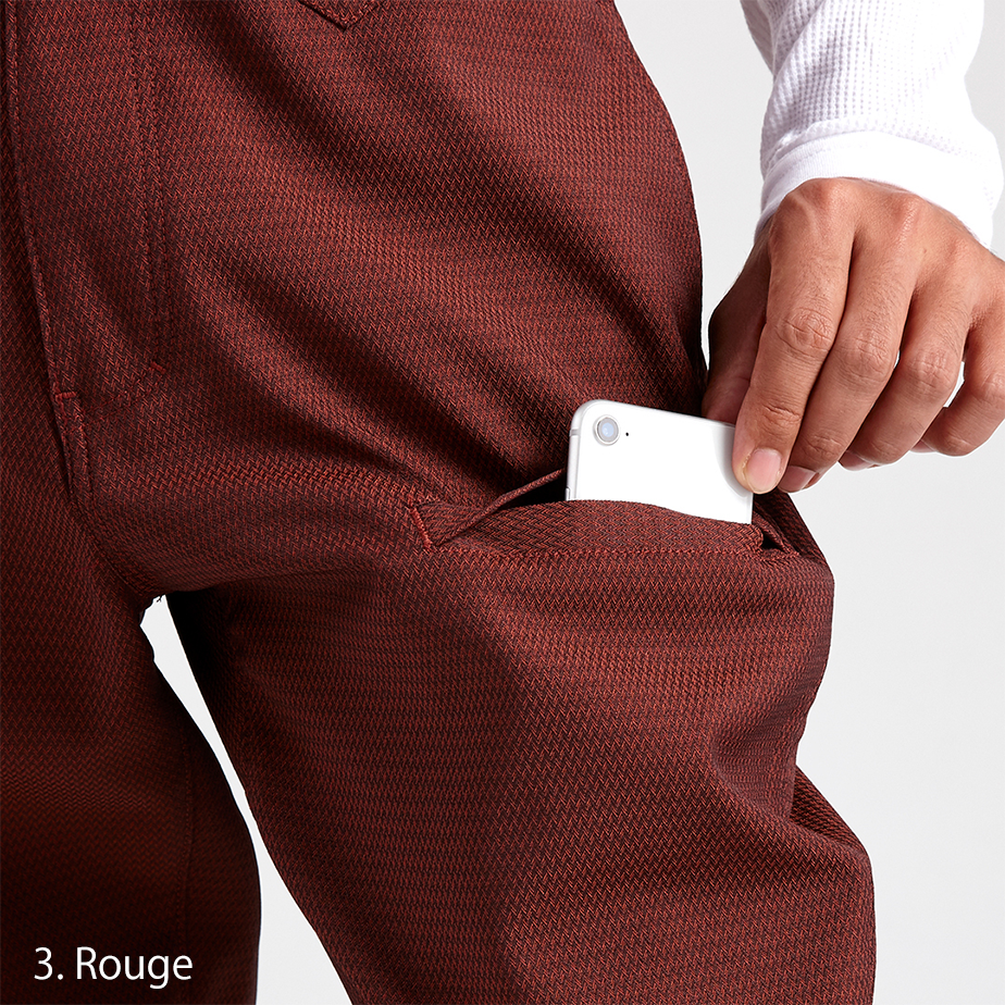 Model walking in the Toraichi Torastyle pants in rouge representing freedom of movement and modern Japanese design.