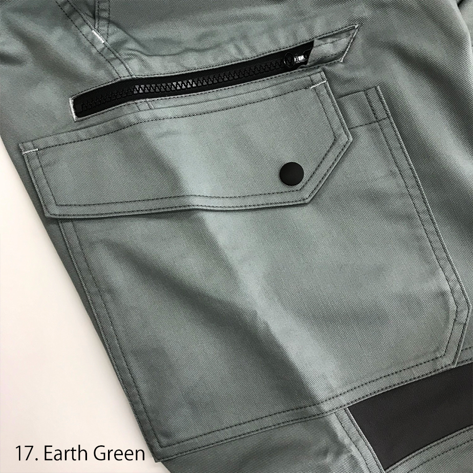 Side view of the Toraichi Japanese workwear pants in silver demonstrating the layered pocket structure and strong seam finishing.