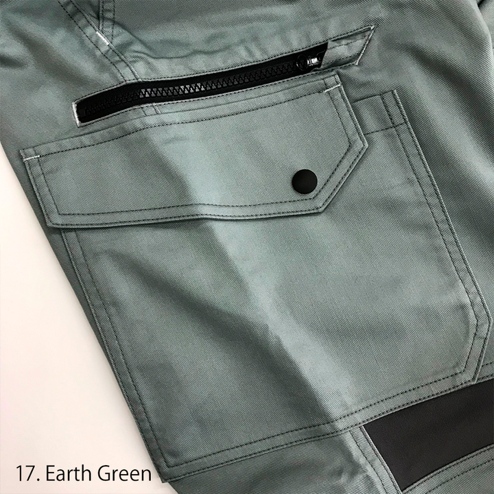Side view of the Toraichi Japanese workwear pants in silver demonstrating the layered pocket structure and strong seam finishing.