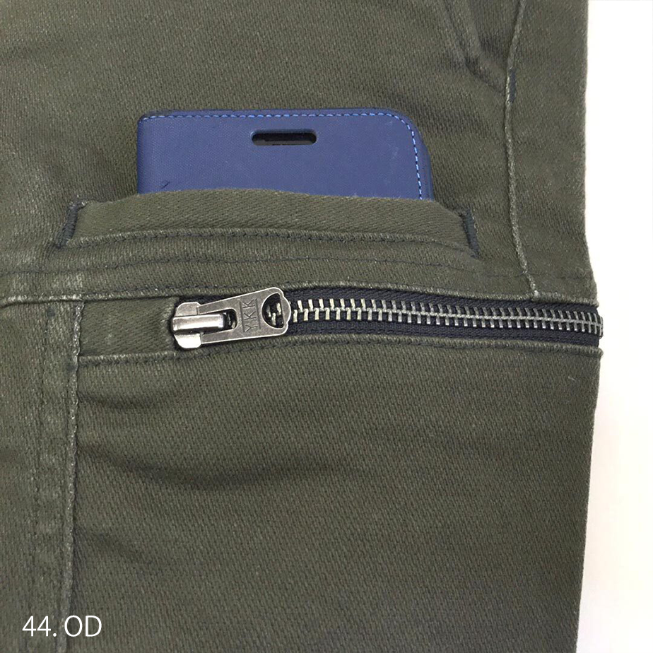 Rear pocket with secure zipper and double-stitched seam