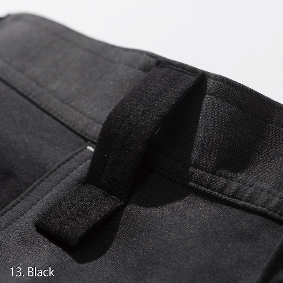 Model wearing the Toraichi Japanese workwear cargo jogger pants in dark navy, showing the structured jogger taper and elastic cuff.