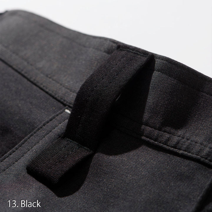 Model wearing the Toraichi Japanese workwear cargo jogger pants in dark navy, showing the structured jogger taper and elastic cuff.