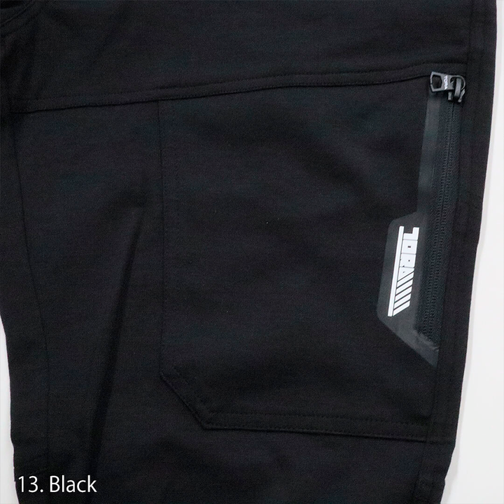 Front close-up of the Toraichi workwear jogger pants showing textured Cordura nylon surface and precision tailoring.