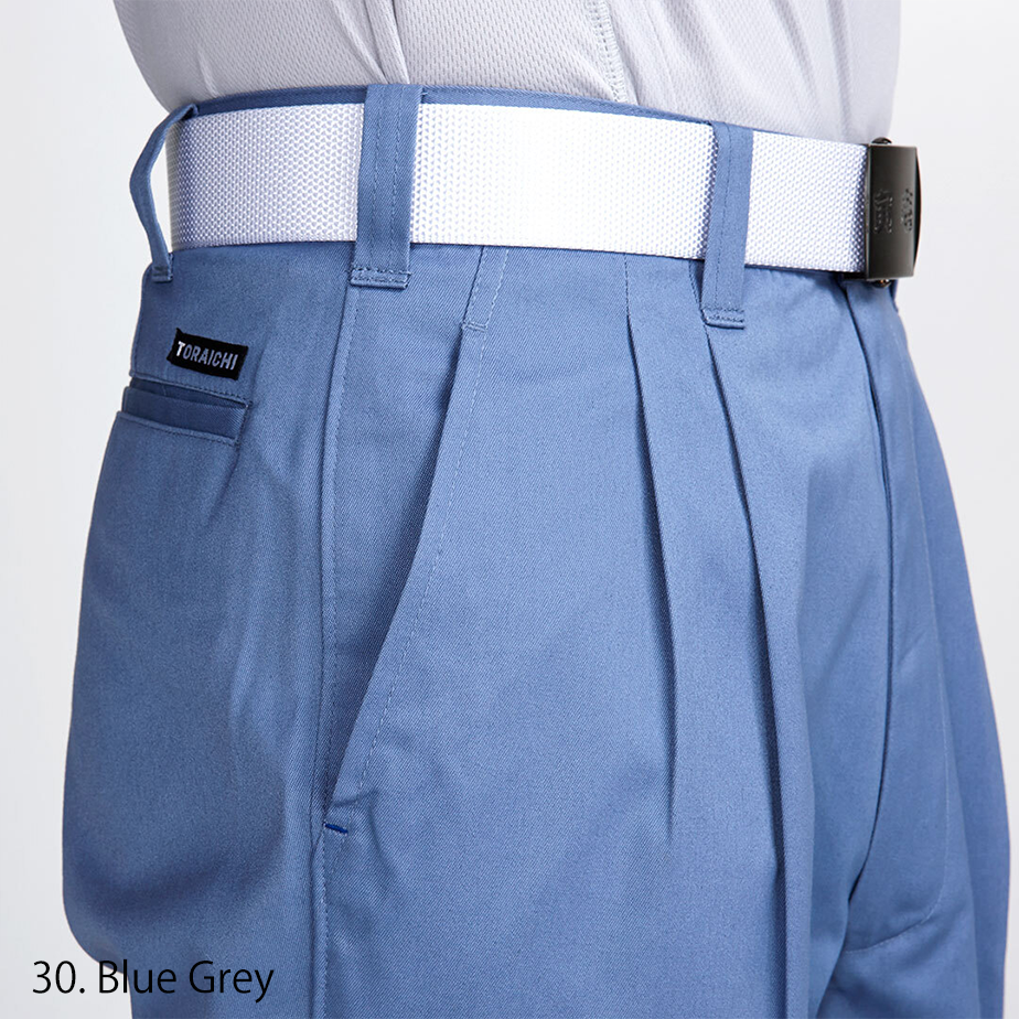 Modern Japanese workwear blue-grey two-tuck pants, full body side profile