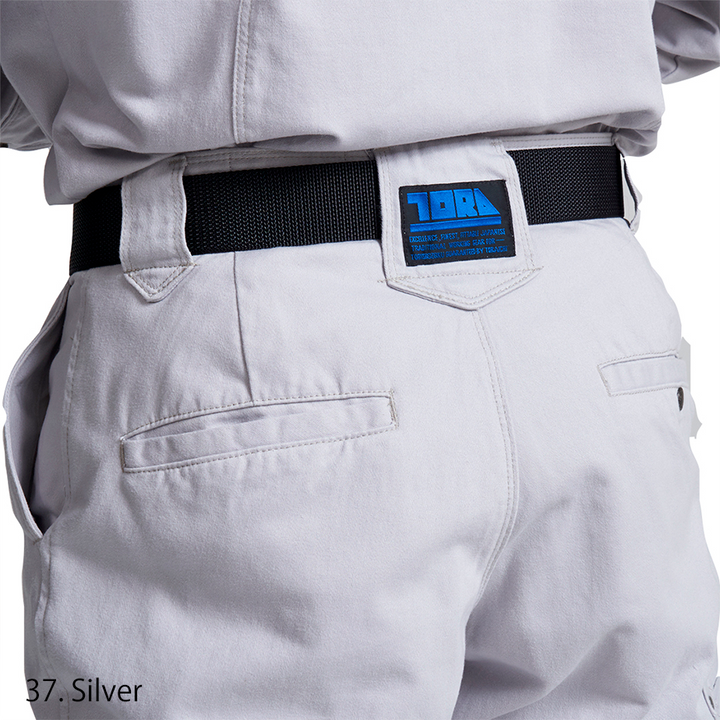 Close-up of the waistband and button fastening on the Toraichi Japanese workwear pants showcasing solid construction.