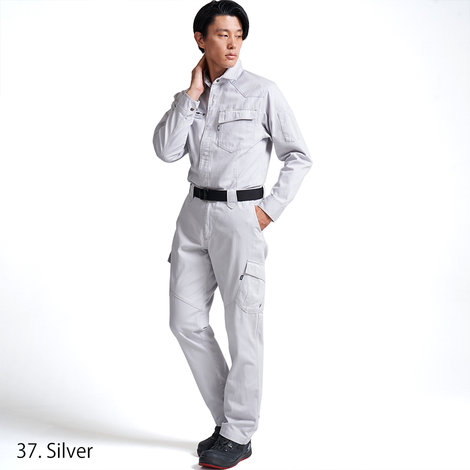 Model wearing the Toraichi Japanese workwear trousers in silver highlighting the soft 100% cotton texture and ergonomic knee stitching.