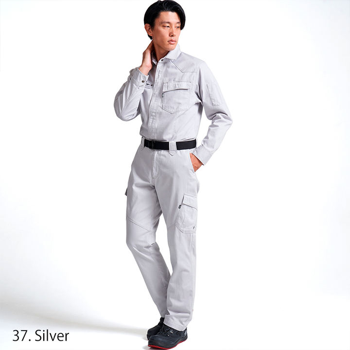 Model wearing the Toraichi Japanese workwear trousers in silver highlighting the soft 100% cotton texture and ergonomic knee stitching.