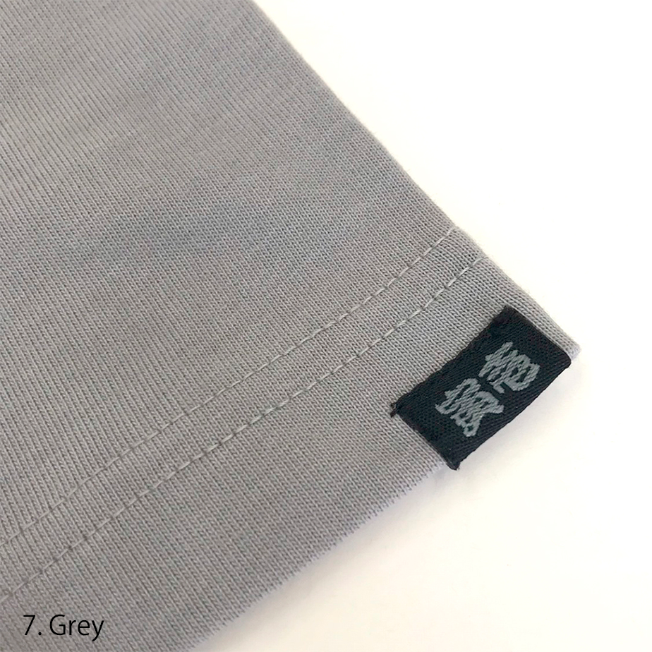 Macro image of the Cordura-blend jersey knit fabric showing smooth texture and fine weave.