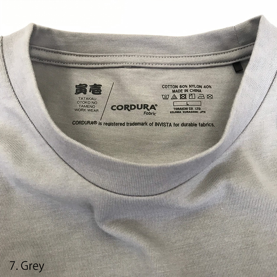Detailed shot of the inner neckline tag on the Toraichi 9523-618 T-shirt displaying brand label and production quality.