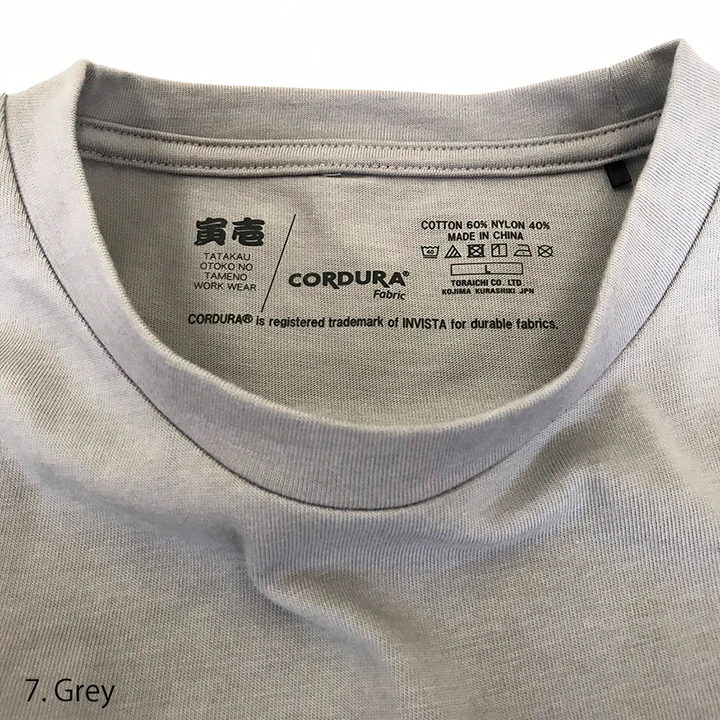 Detailed shot of the inner neckline tag on the Toraichi 9523-618 T-shirt displaying brand label and production quality.