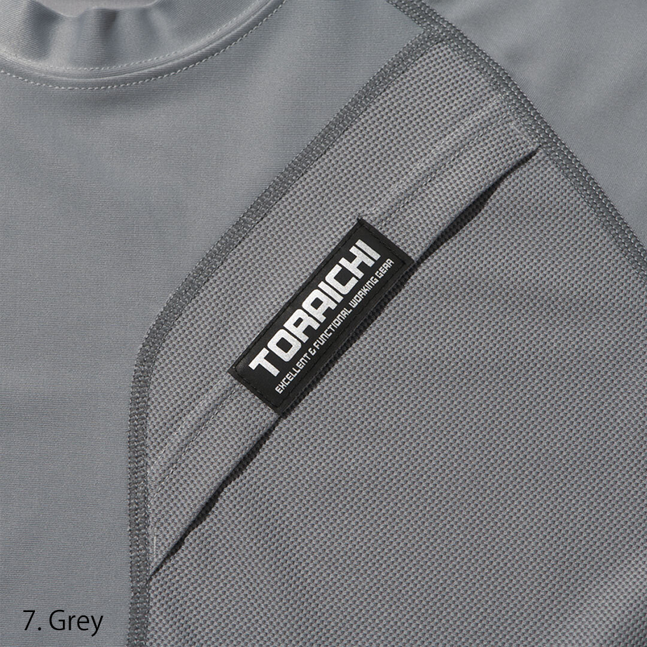 Close-up of the chest pocket with tonal logo tag on the Toraichi Japanese workwear crew neck shirt demonstrating functional design.