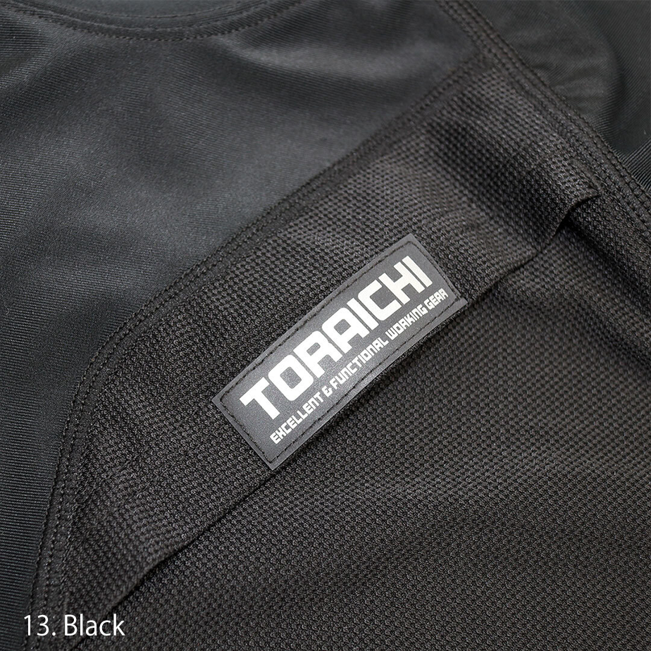 Detail of the lower hem and side panel on the Toraichi 5982-617 shirt showing reinforced stitching and flexible stretch.
