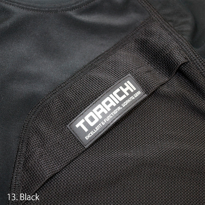 Detail of the lower hem and side panel on the Toraichi 5982-617 shirt showing reinforced stitching and flexible stretch.