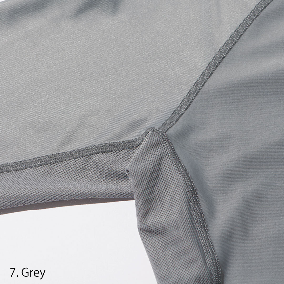Detailed shot of the sleeve seam and flatlock stitching emphasizing durability and comfort for active work.