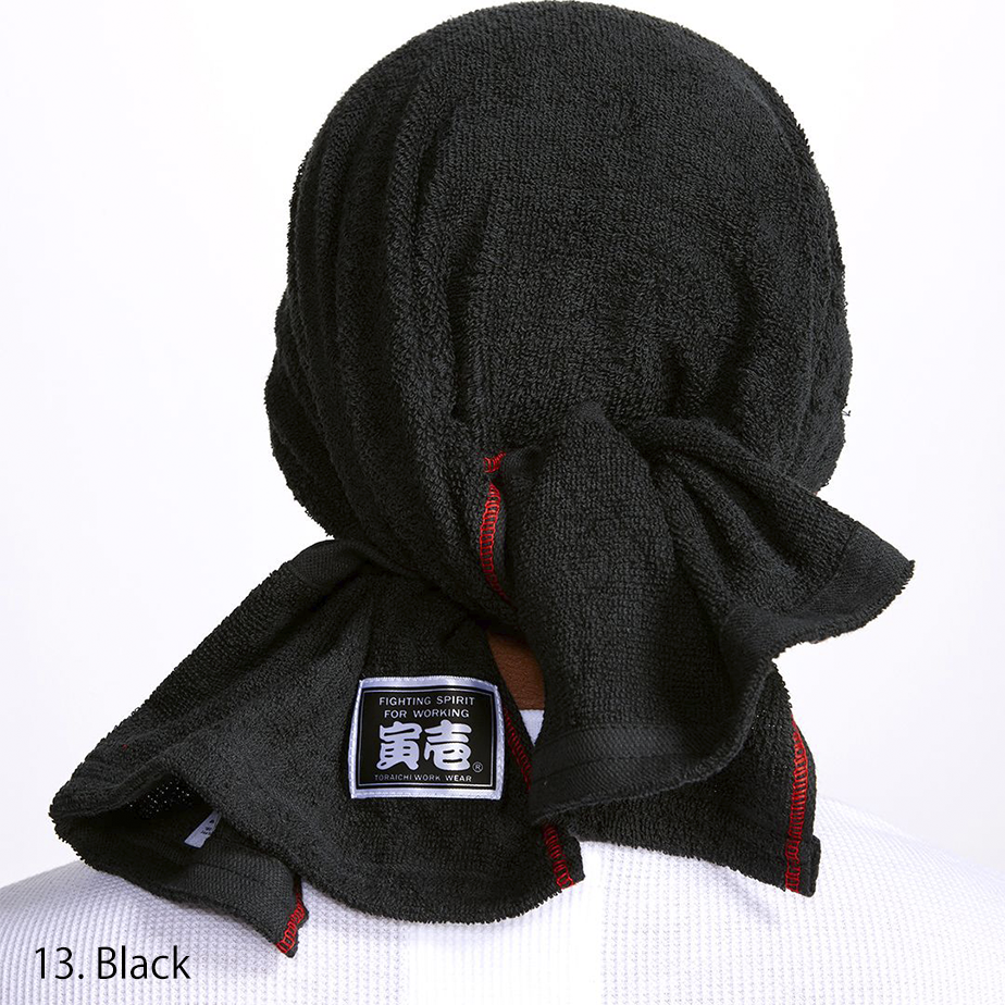 Back view of the same black towel showing red-edged stitching and label details